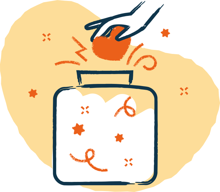 A hand putting a heart shape in a jar