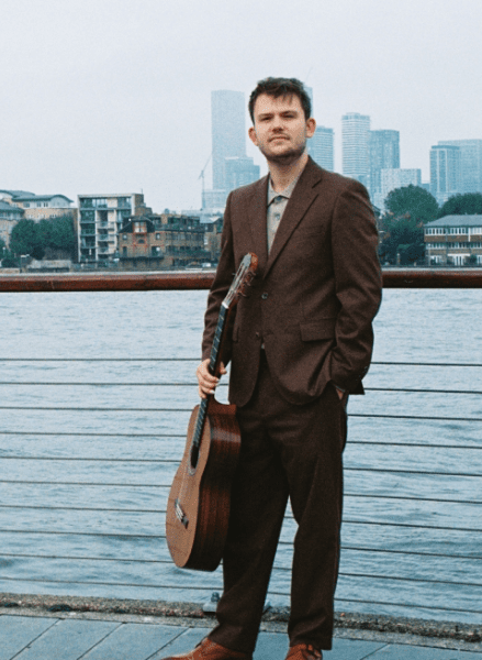Coffee Concert:  Luke Tyrrell - Spanish Guitar and Spoken Word Poetry banner image